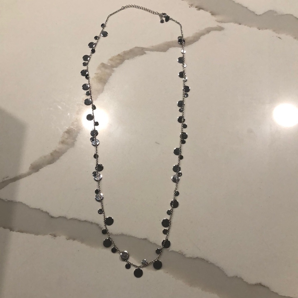 Silver necklace. Silver dots.